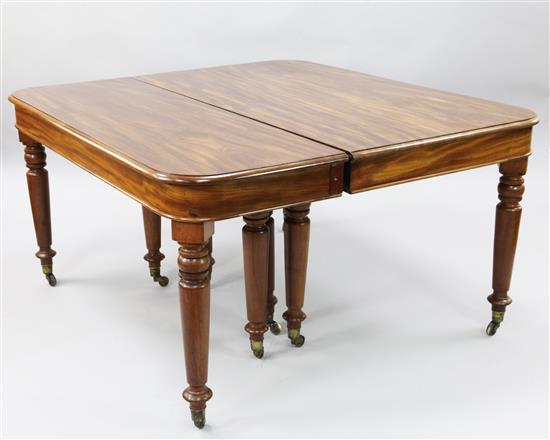 An impressive early Victorian mahogany extending dining table, W.4ft 7in. Extends to 15ft.